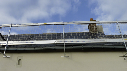 Safety barrier on a sloping roof.